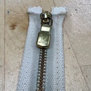 Louis Vuitton 6.5” Cream/Brass Zipper